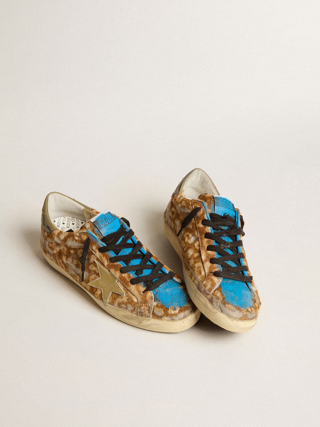 Men’s Super-Star LAB in leopard pony skin with gold star and gray heel tab