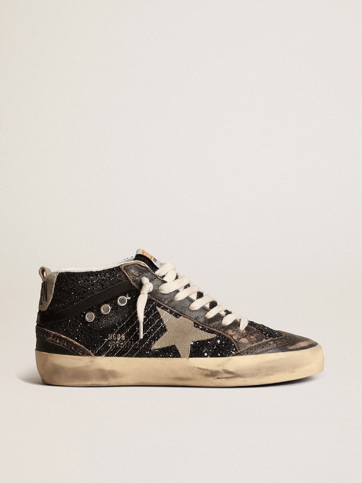 Mid Star da donna in glitter nero con stella in suede grigio tortora e linguetta sul tallone