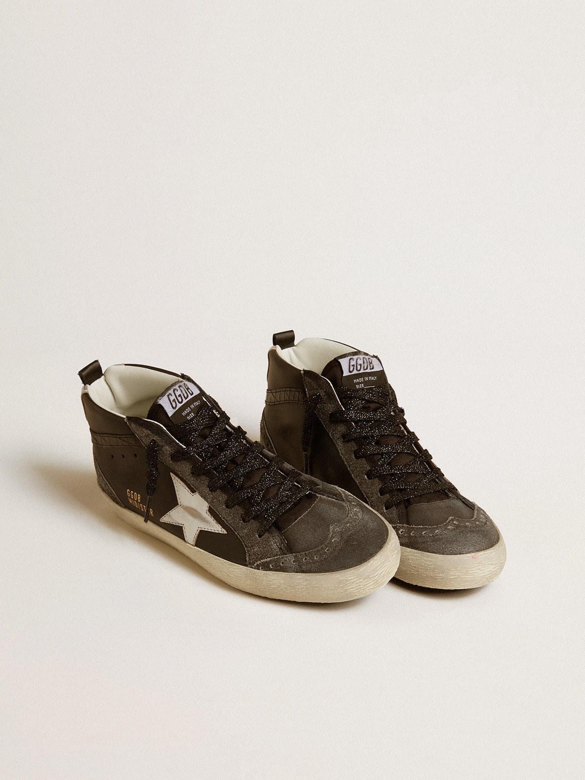 Mid Star da donna in pelle nera con stella in pelle metallizzata argento