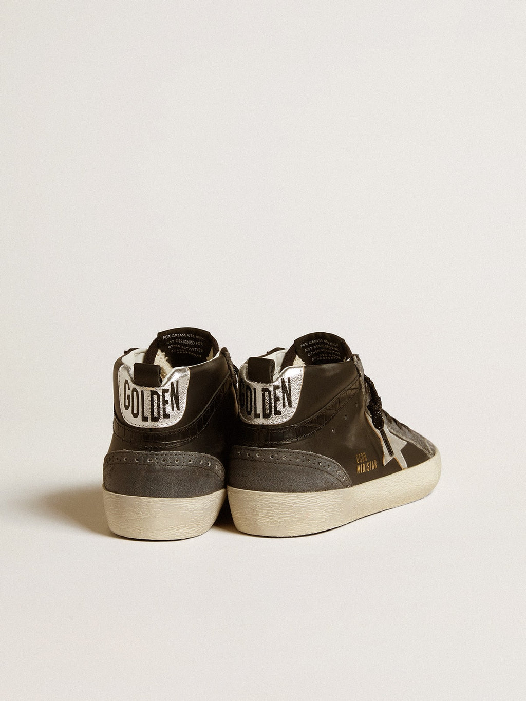 Mid Star da donna in pelle nera con stella in pelle metallizzata argento