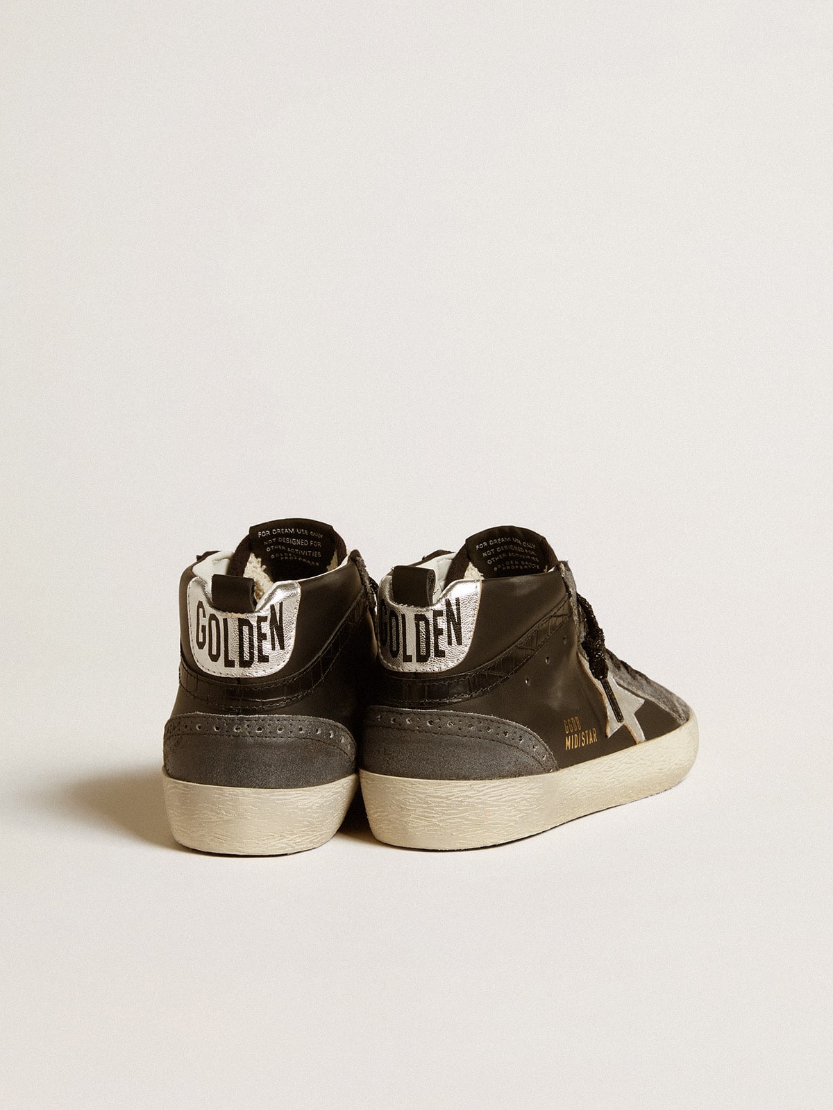 Mid Star da donna in pelle nera con stella in pelle metallizzata argento