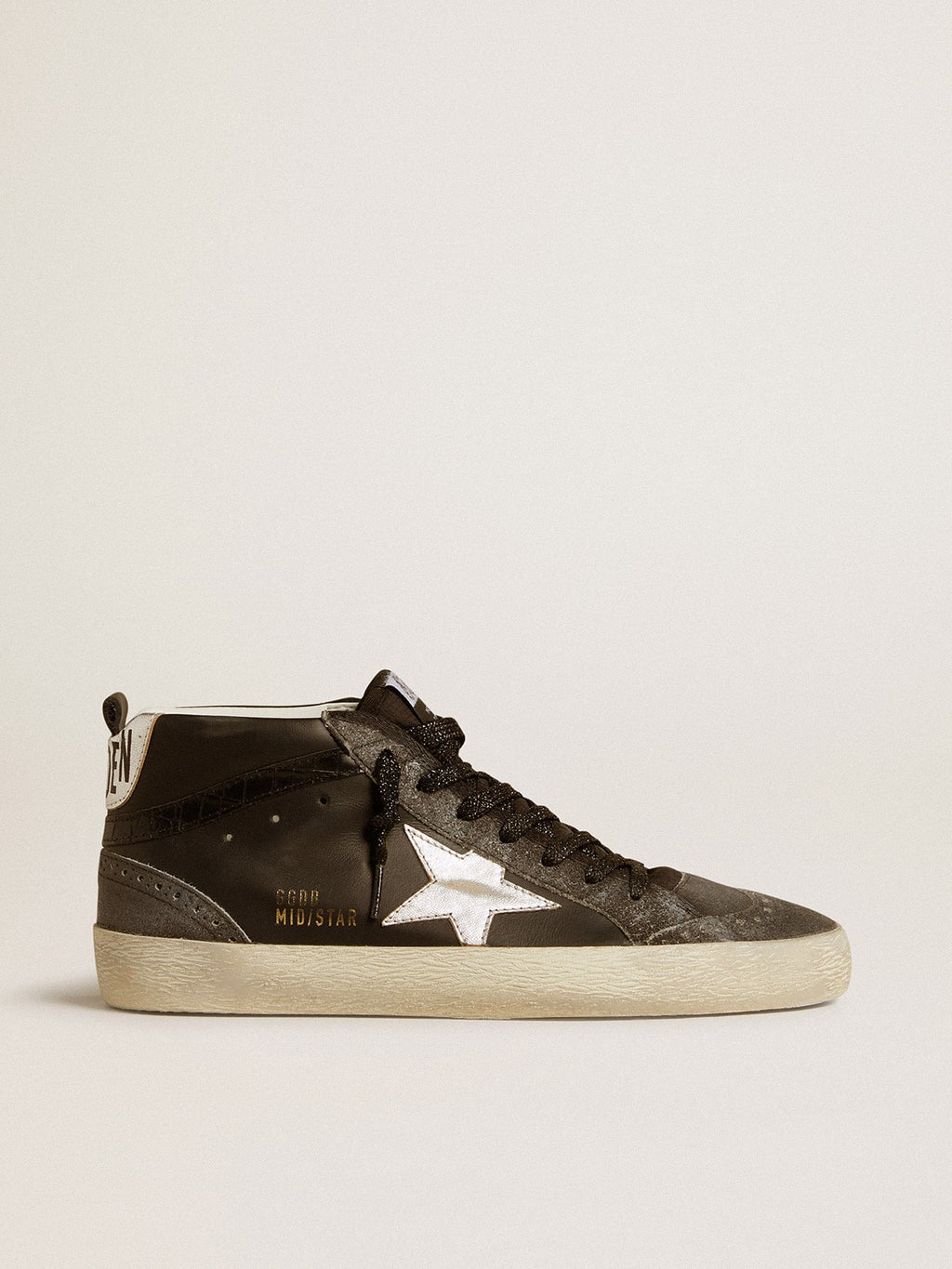 Mid Star da donna in pelle nera con stella in pelle metallizzata argento