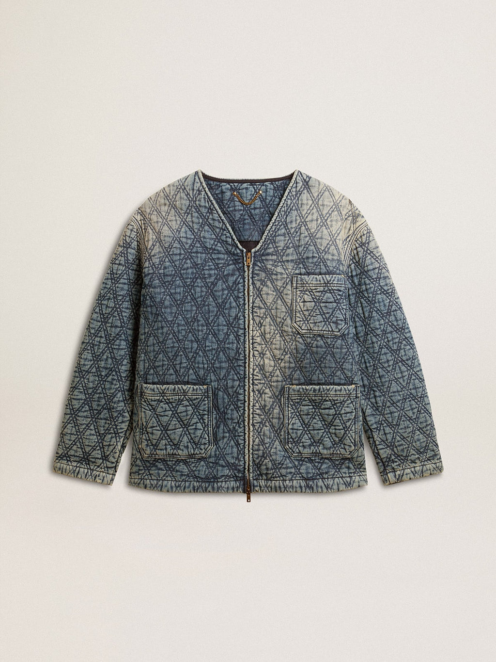 Giacca trapuntata blu da donna in denim di cotone con finitura consumata 